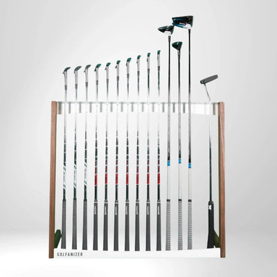 Designer golf club stand made of walnut and white with golf set on white background